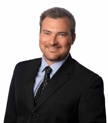 Portrait of Justin Morris, REALTOR®.